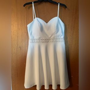 White dress. Great for graduation! Built in cups